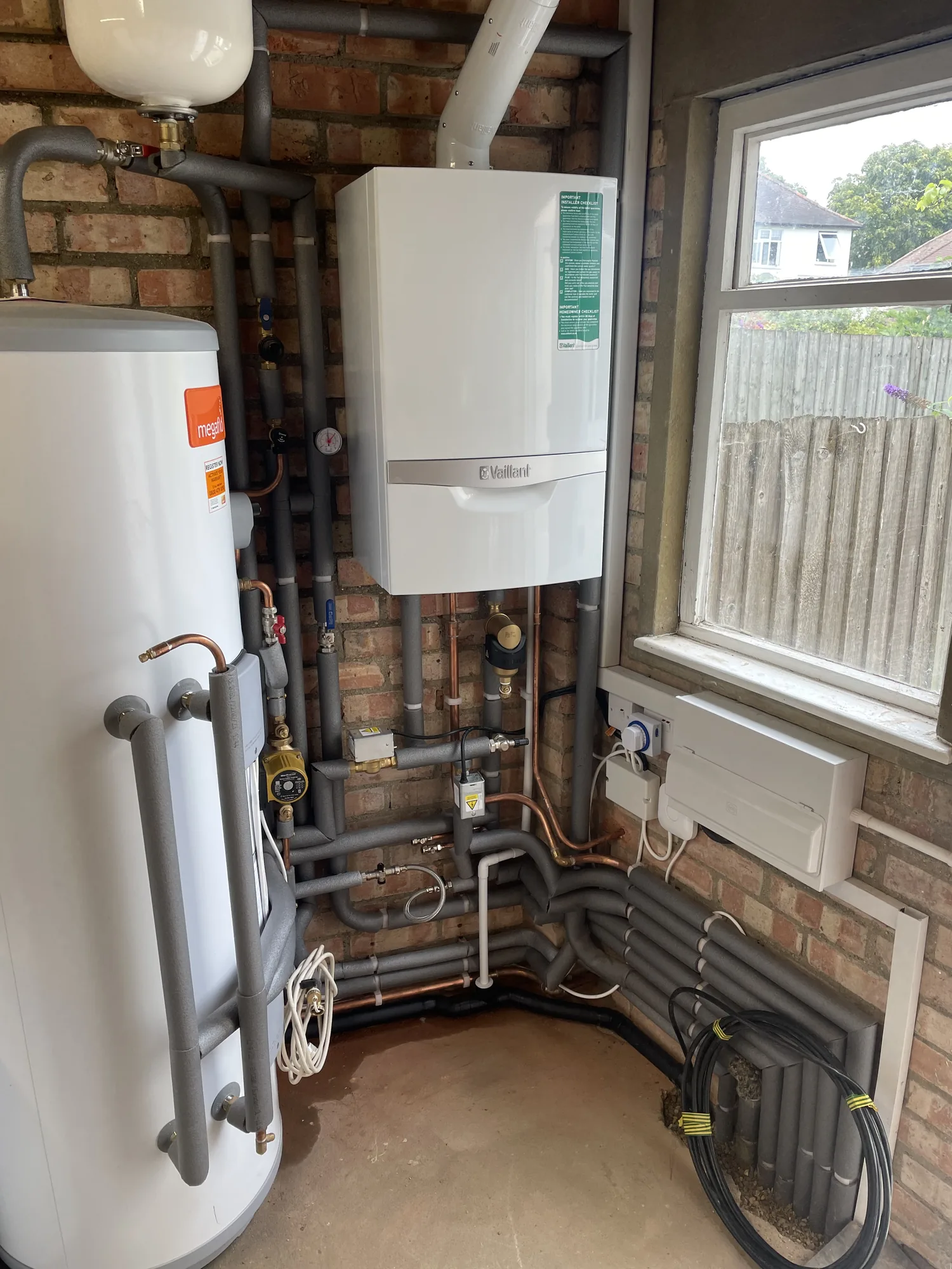 Final boiler housing closed up after a Wimbledon install