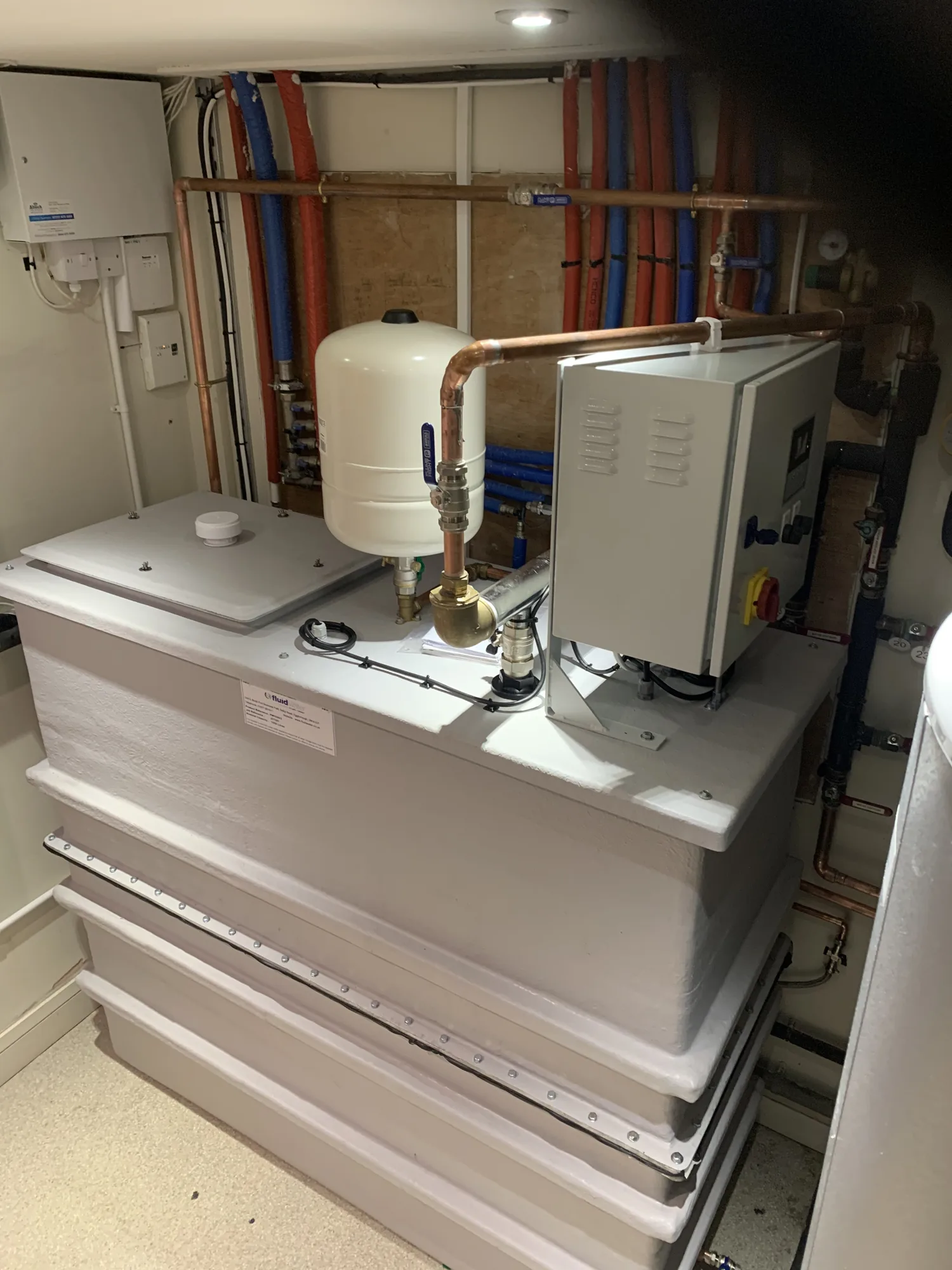 Condensate run terminated tidily to outside drainage