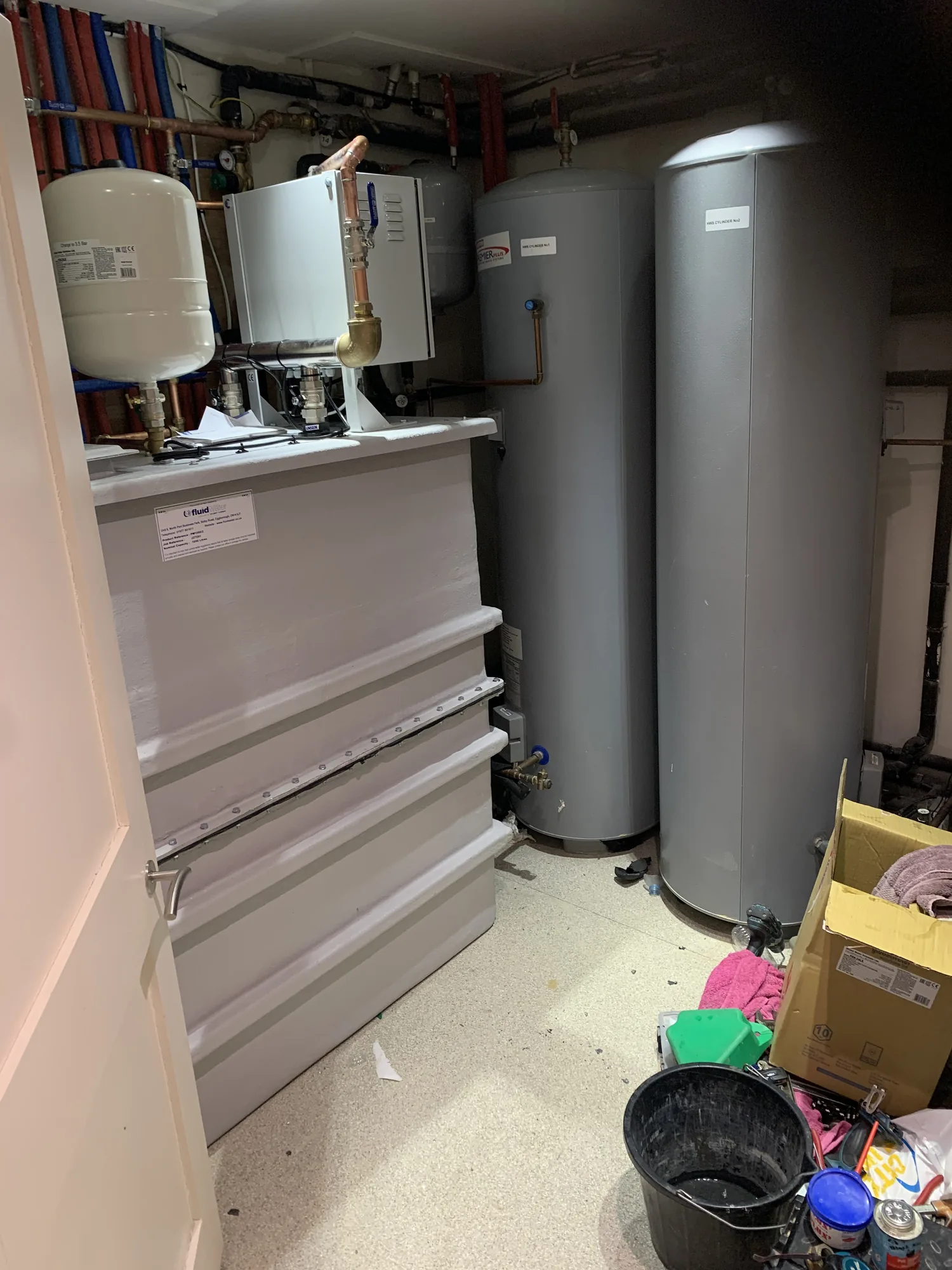 Engineer commissioning a newly fitted combi boiler