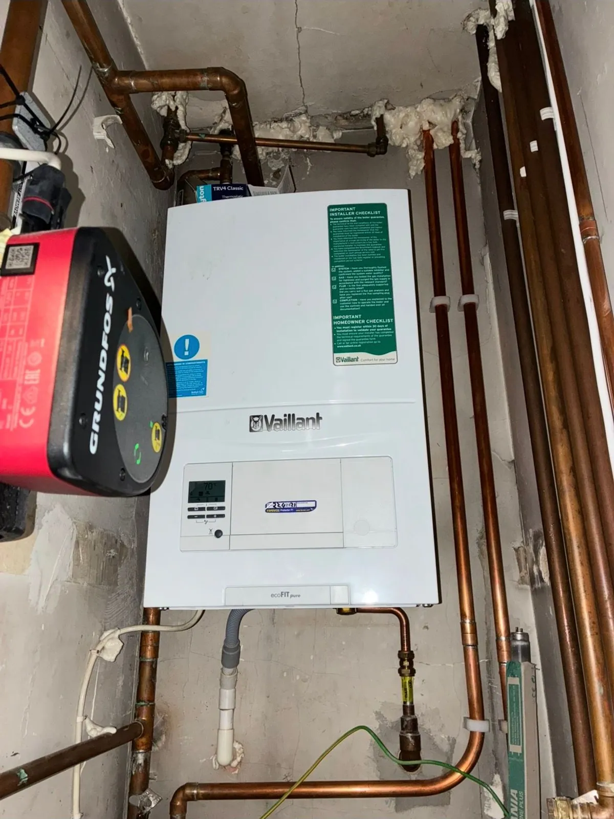 New Vaillant ecoFIT pure boiler and Grundfos pump fitted with new copper pipework at Nork GP Surgery in Banstead